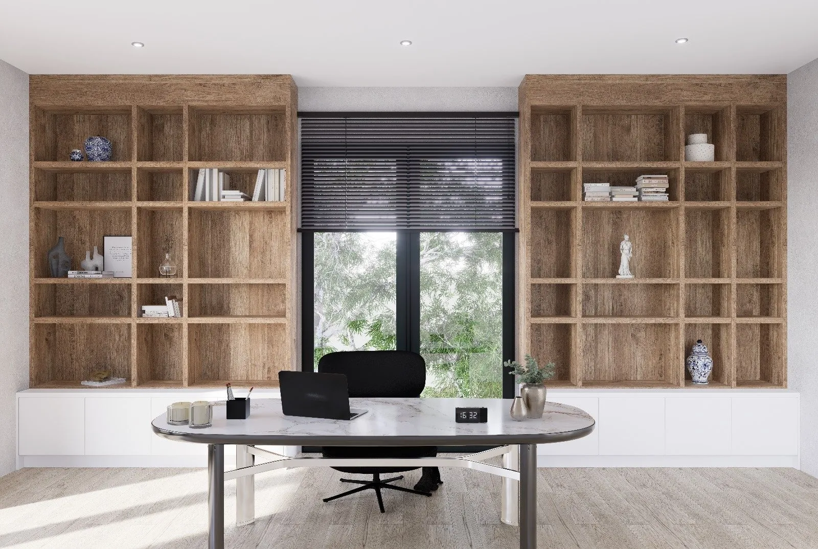 A study with fitted oak shelving carried to the ceiling on both sides of a window, over a run of white cabinets